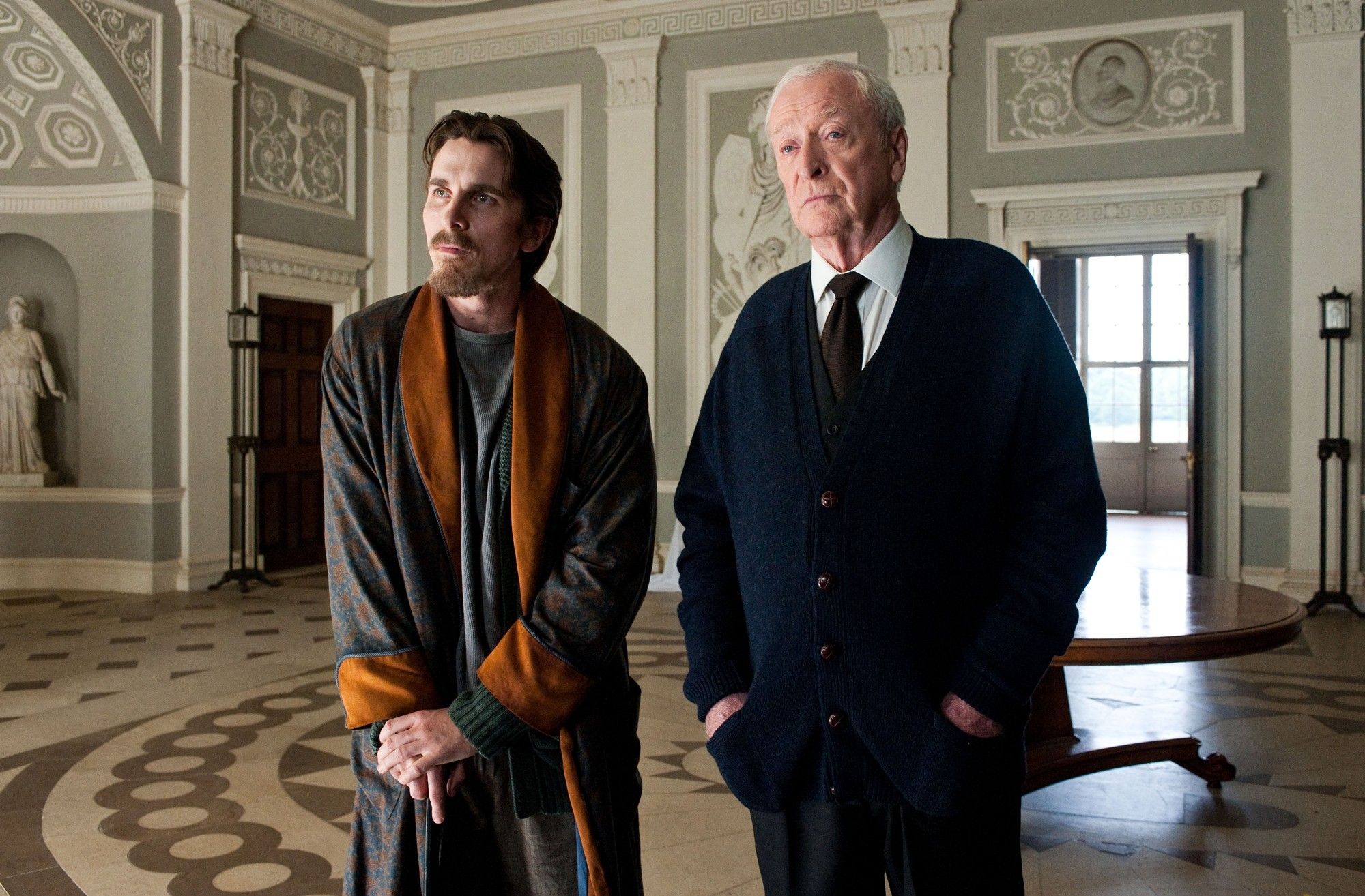 Christian Bale stars as Bruce Wayne/Batman and Michael Caine stars as Alfred in Warner Bros. Pictures' The Dark Knight Rises (2012)