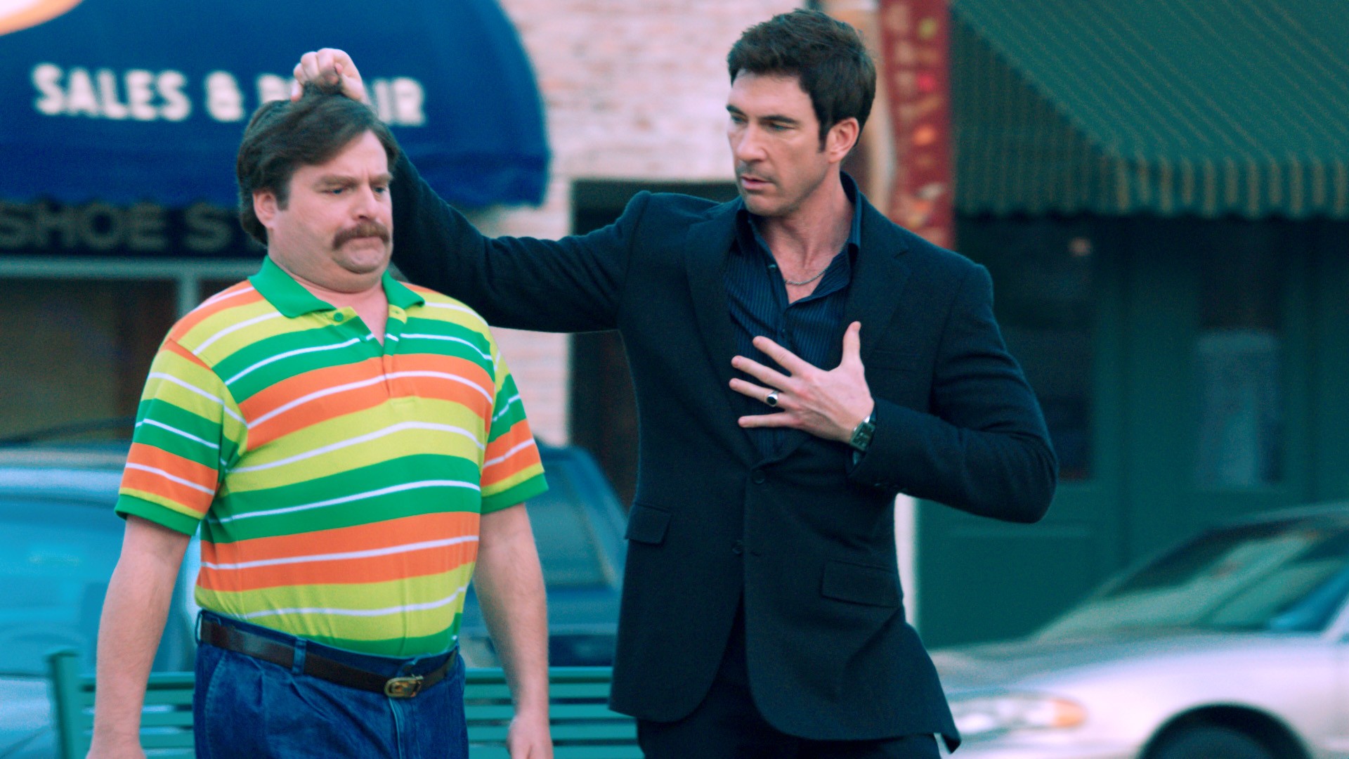 Zach Galifianakis stars as Marty Huggins and Dylan McDermott stars as Tim Wattley in Warner Bros. Pictures' The Campaign (2012)