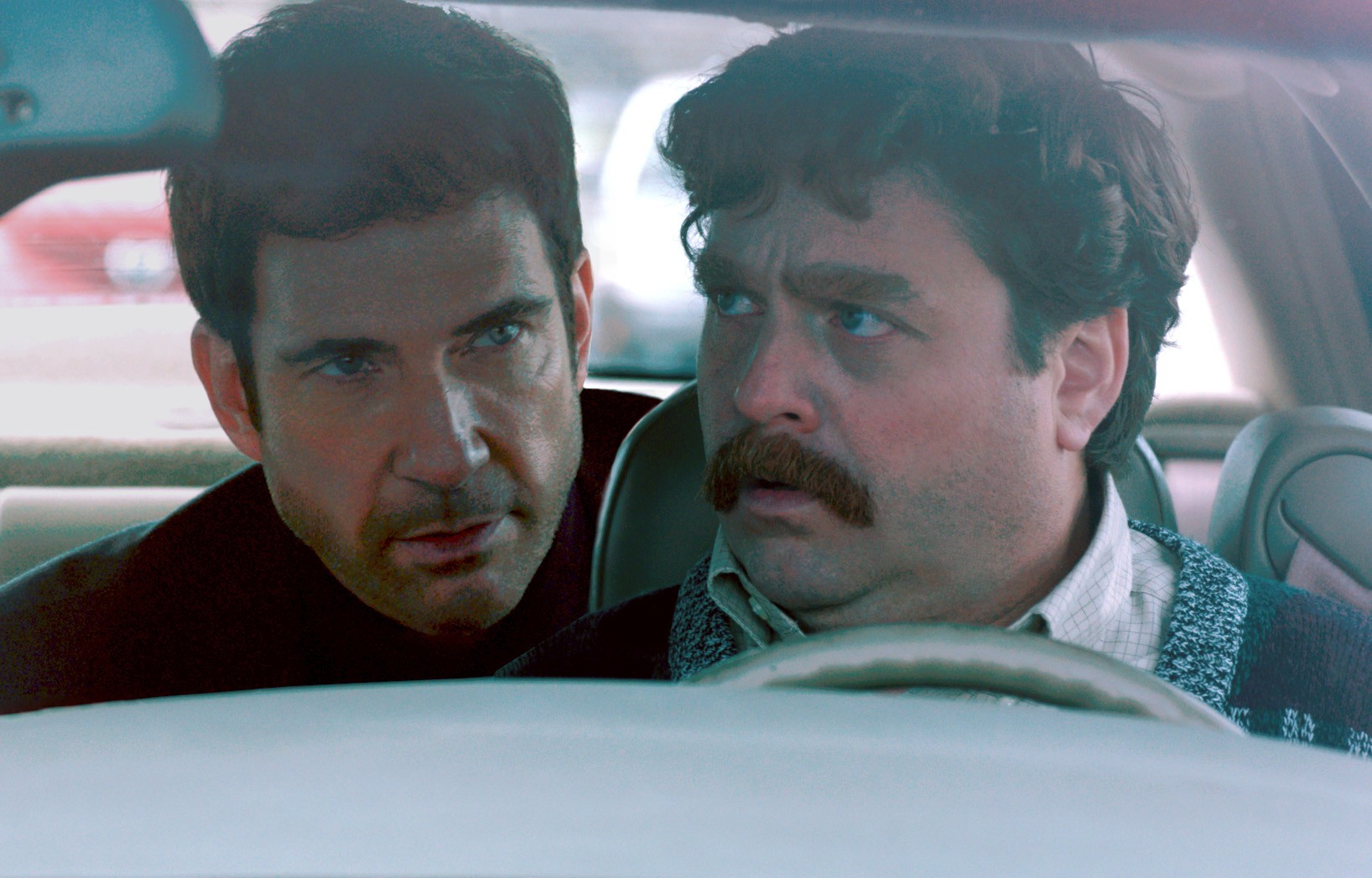 Dylan McDermott stars as Tim Wattley and Zach Galifianakis stars as Marty Huggins in Warner Bros. Pictures' The Campaign (2012)