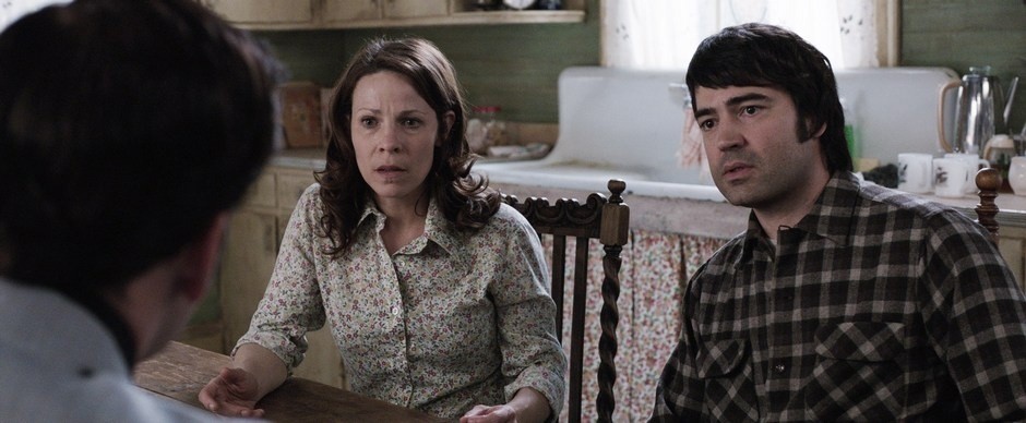 Lili Taylor stars as Carolyn Perron and Ron Livingston stars as Roger Perron in Warner Bros. Pictures' The Conjuring (2013)