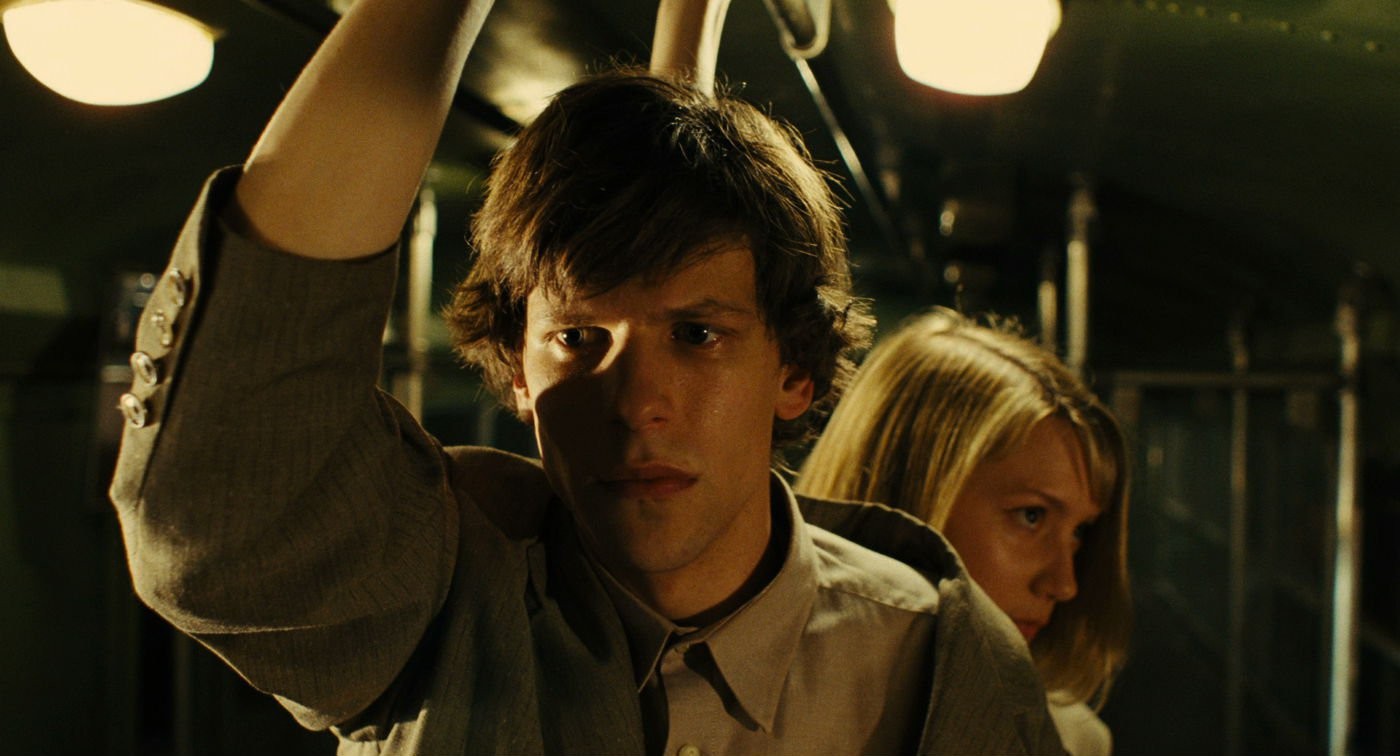 Jesse Eisenberg stars as Simon/James and Mia Wasikowska stars as Hannah in Magnolia Pictures' The Double (2014)