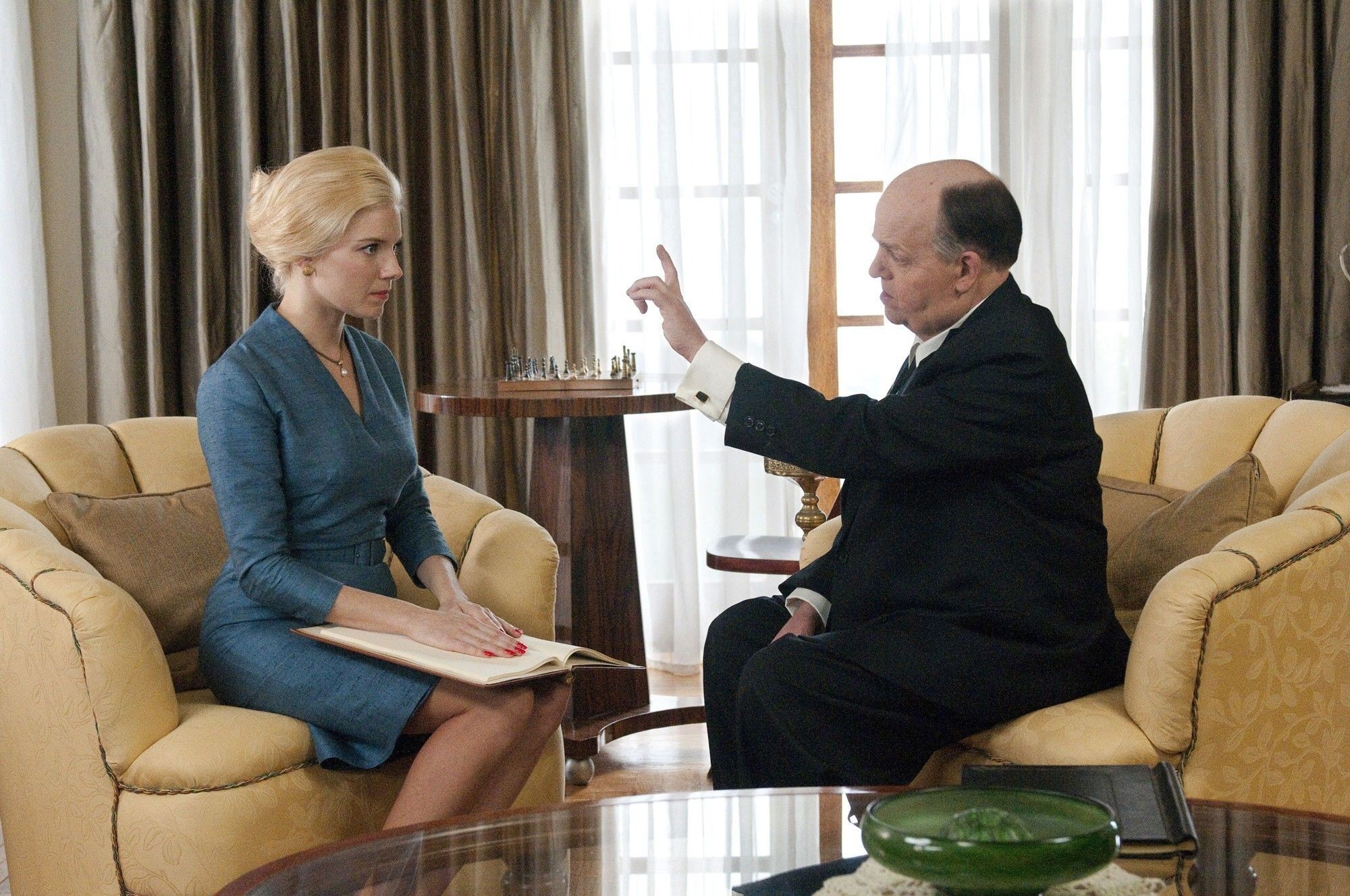 Sienna Miller stars as Tippi Hedren and Toby Jones stars as Alfred Hitchcock in HBO Films' The Girl (2012)