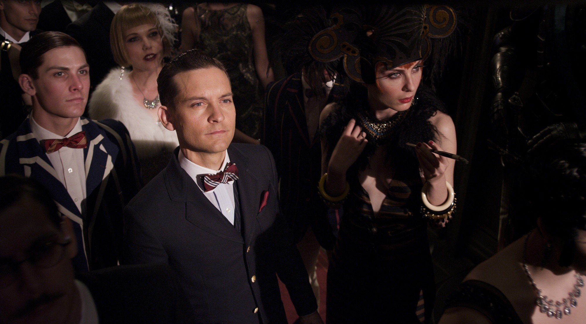 Tobey Maguire stars as Nick Carraway and Elizabeth Debicki stars as Jordan Baker in Warner Bros. Pictures' The Great Gatsby (2013)