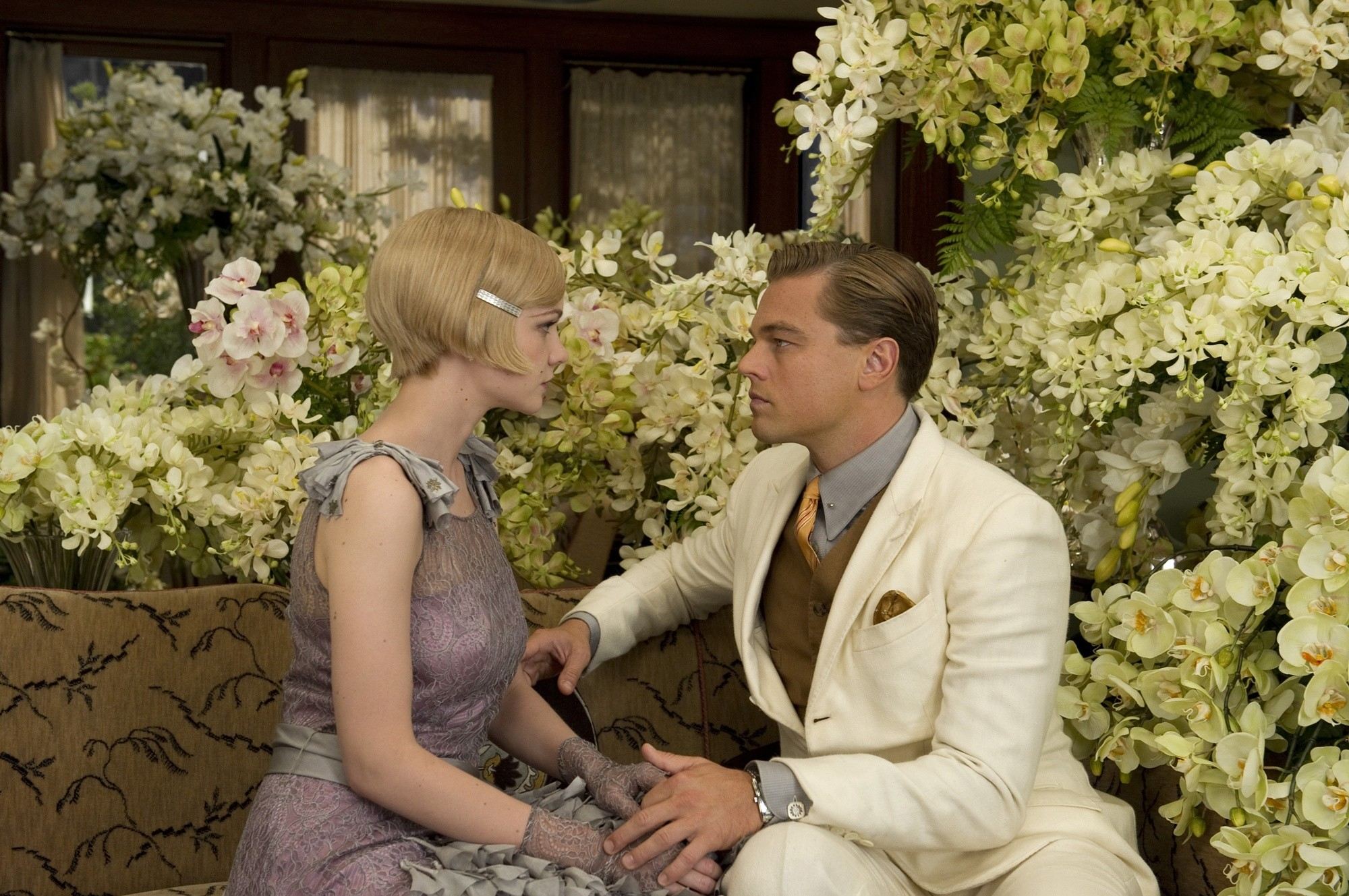 Carey Mulligan stars as Daisy Buchanan and Leonardo DiCaprio stars as Jay Gatsby in Warner Bros. Pictures' The Great Gatsby (2013)