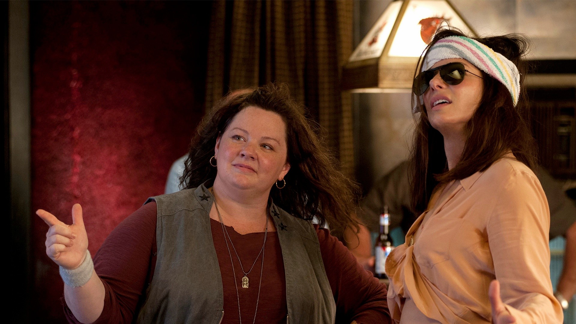 Melissa McCarthy stars as Det. Shannon Mullins and  	Sandra Bullock stars as Special Agent Sarah Ashburn in 20th Century Fox's The Heat (2013)
