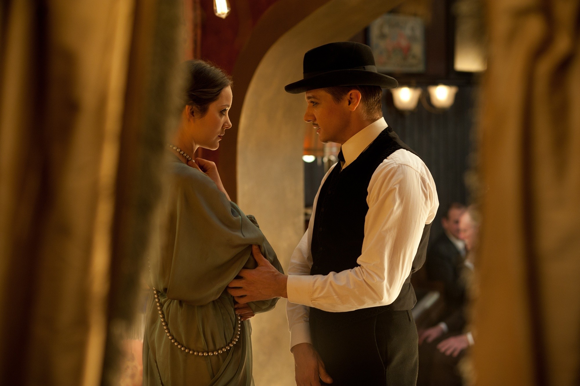 Marion Cotillard stars as Ewa Cybulski and Jeremy Renner stars as Orlando the Magician in The Weinstein Company's The Immigrant (2014)