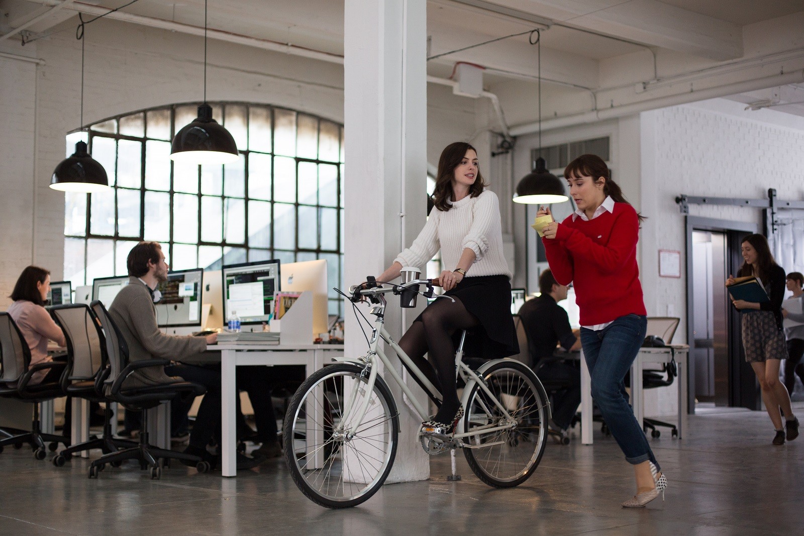 Anne Hathaway stars as Jules Ostin and Christina Scherer stars as Becky Scott in Warner Bros. Pictures' The Intern (2015)