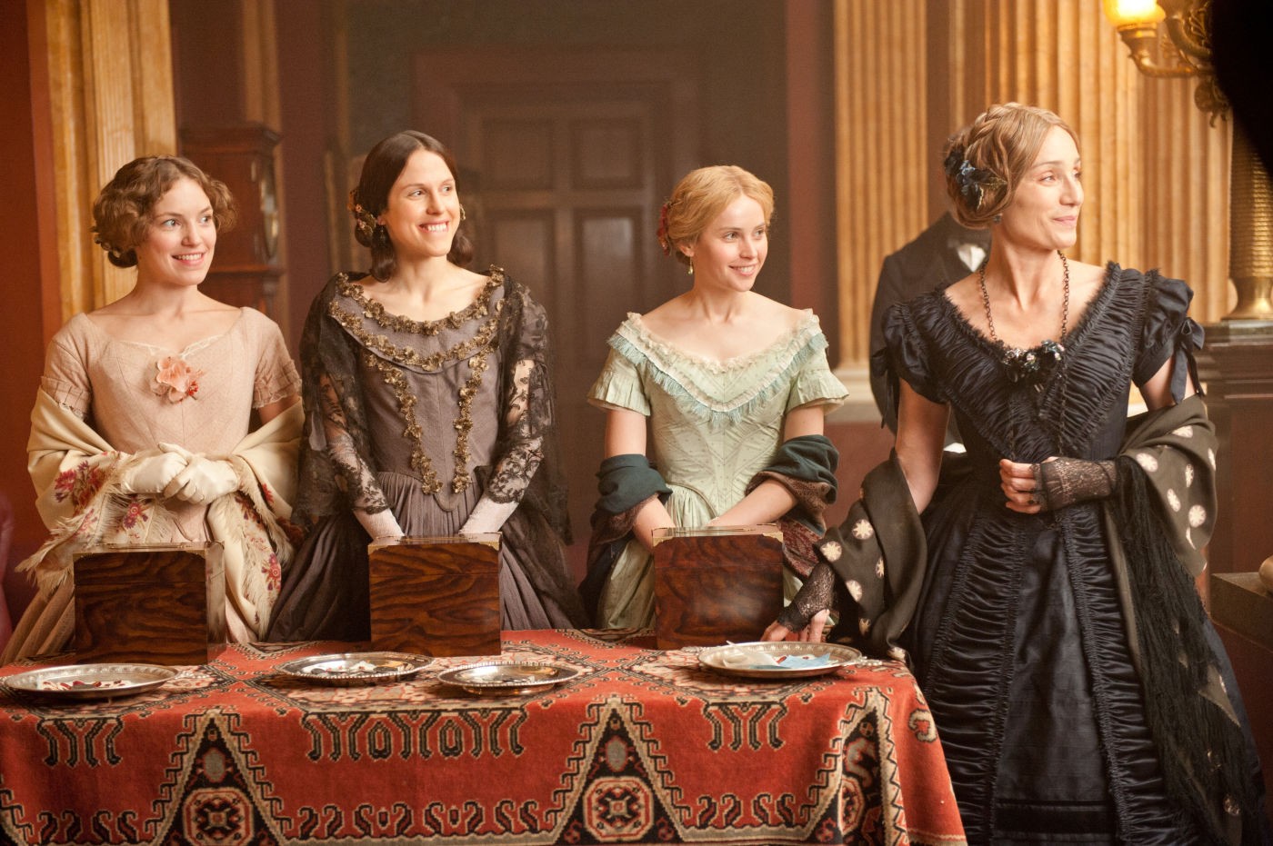Perdita Weeks, Amanda Hale, Felicity Jones and Kristin Scott Thomas in Sony Pictures Classics' The Invisible Woman (2013). Photo credit by David Appleby.