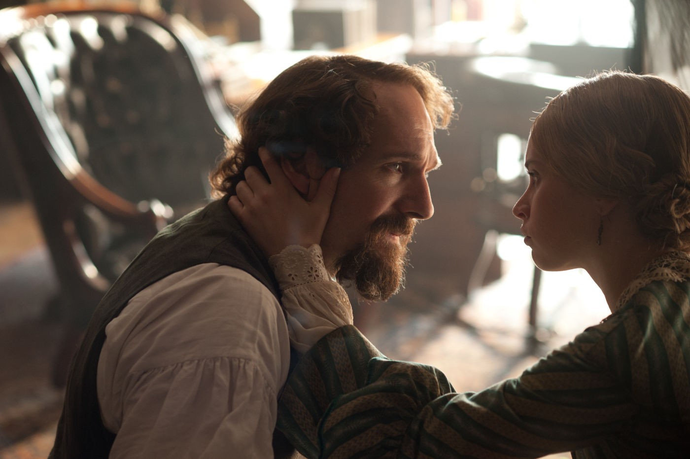 Ralph Fiennes stars as Charles Dickens and Felicity Jones stars as Nelly Ternan in Sony Pictures Classics' The Invisible Woman (2013). Photo credit by David Appleby.