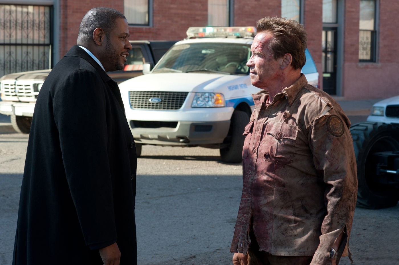 Forest Whitaker stars as Agent John Bannister and Arnold Schwarzenegger stars as Sheriff Ray Owens in Lionsgate Films' The Last Stand (2013)