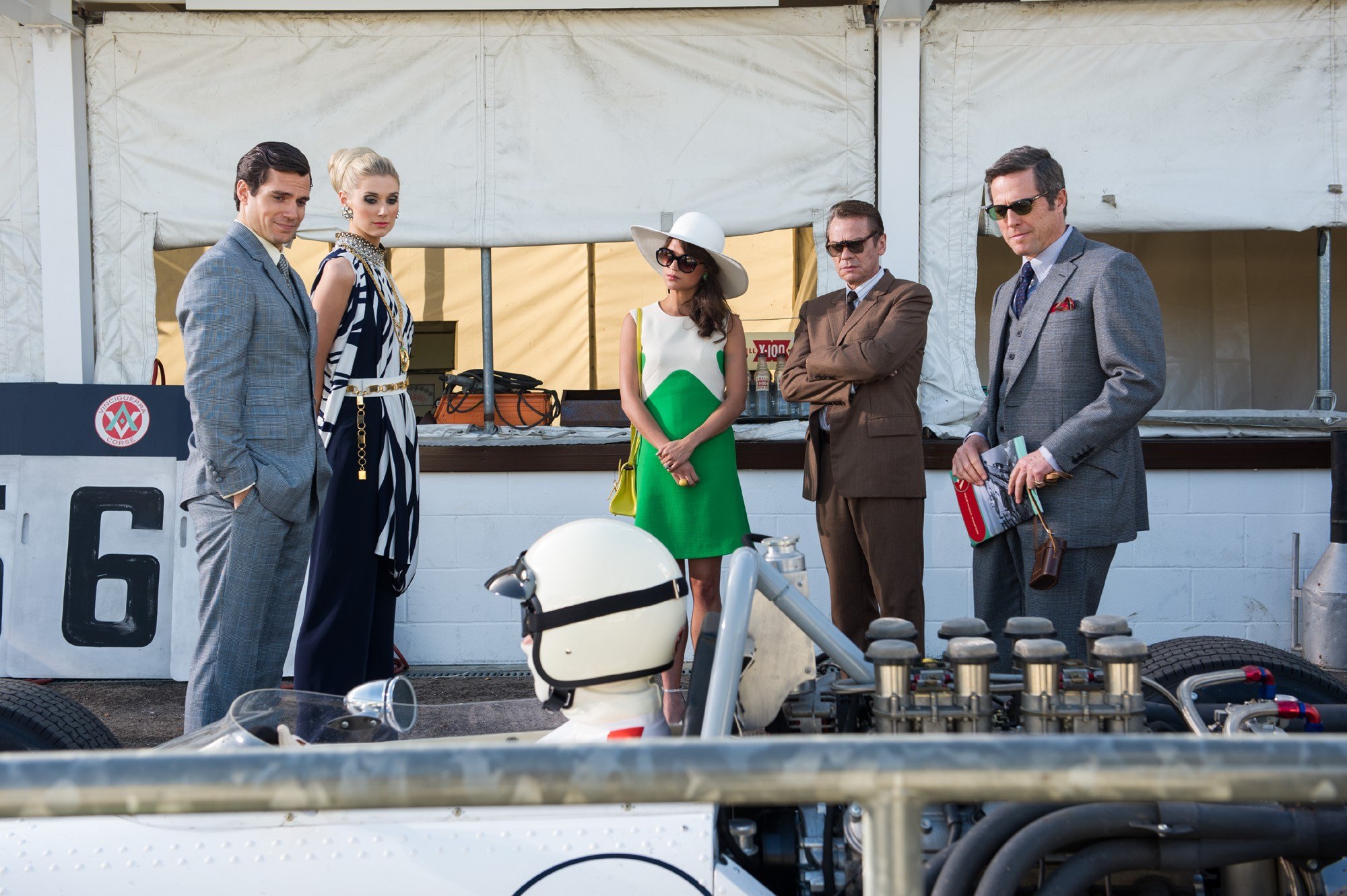 Henry Cavill, Elizabeth Debicki, Alicia Vikander and Hugh Grant in Warner Bros. Pictures' The Man from U.N.C.L.E. (2015)