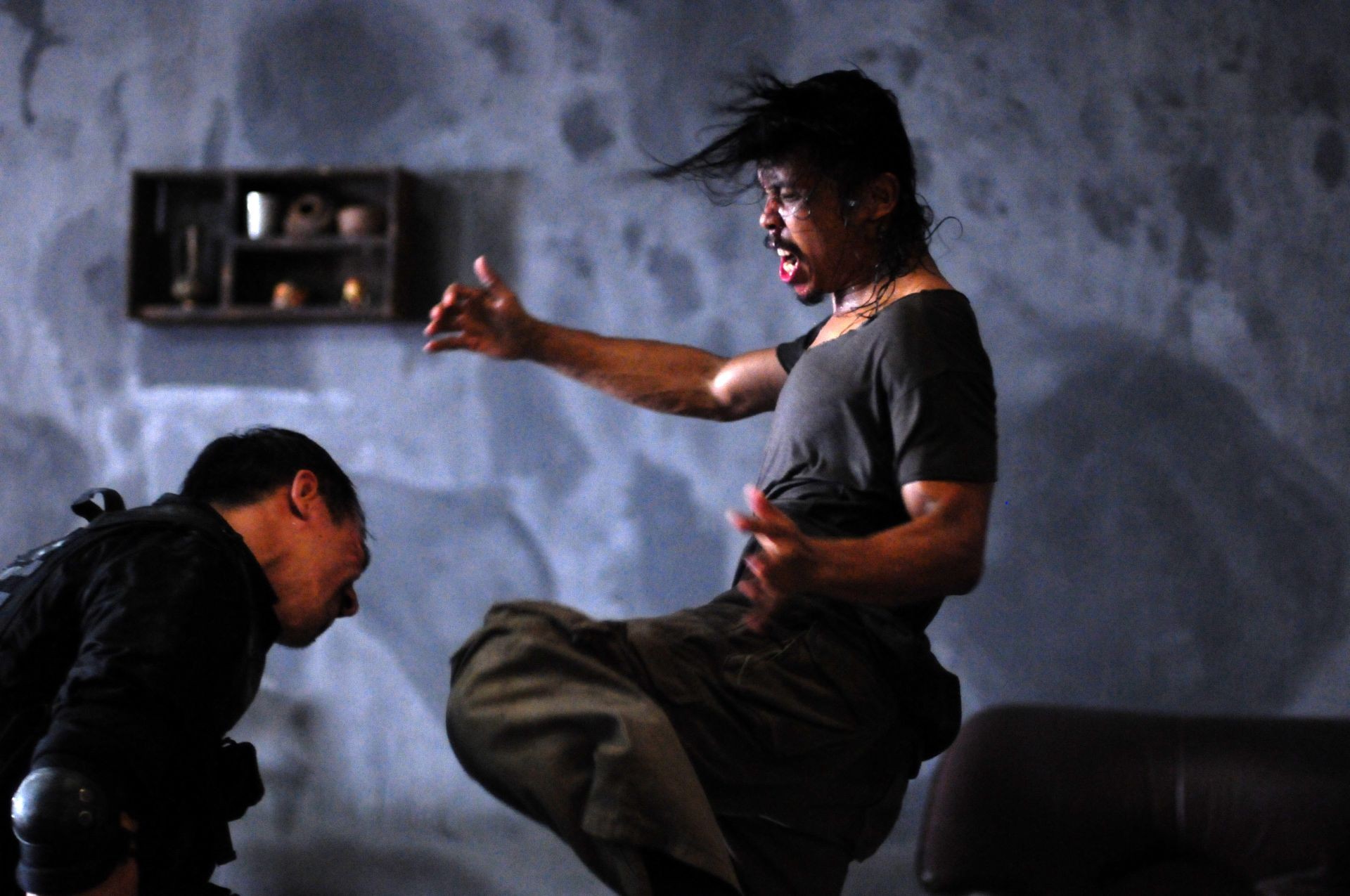 Yayan Ruhian stars as Yayan Ruhian in Mad Dog in Sony Pictures Classics' The Raid: Redemption (2012)