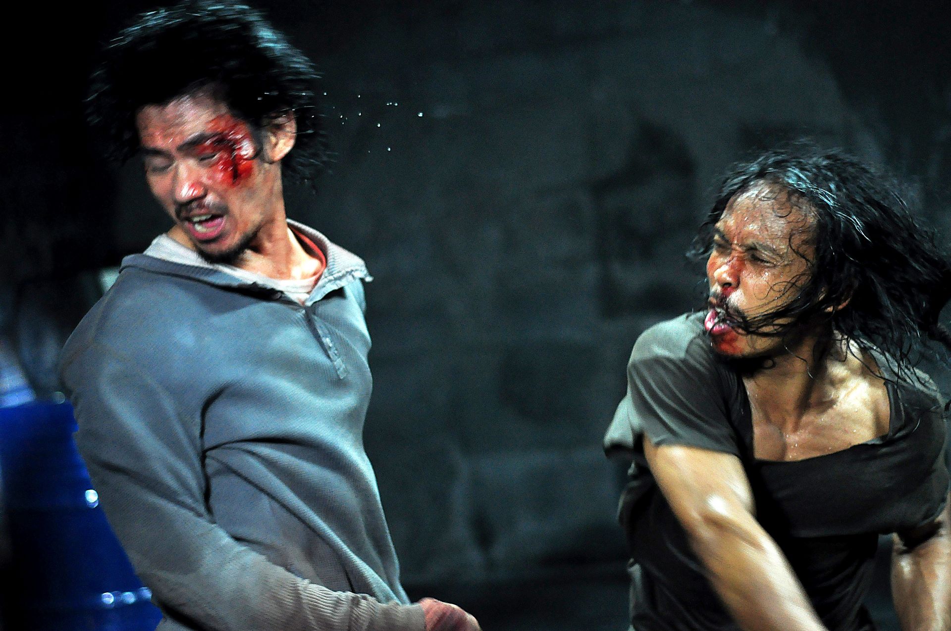 Doni Alamsyah stars as Andi and Yayan Ruhian stars as Mad Dog in Sony Pictures Classics' The Raid: Redemption (2012). Photo credit by Akhirwan Nurhaidir.