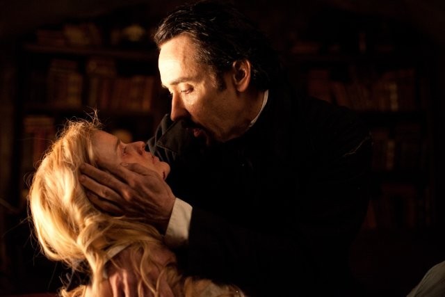 Alice Eve stars as Emily Hamilton and John Cusack stars as Edgar Allan Poe in Relativity Media's The Raven (2012)