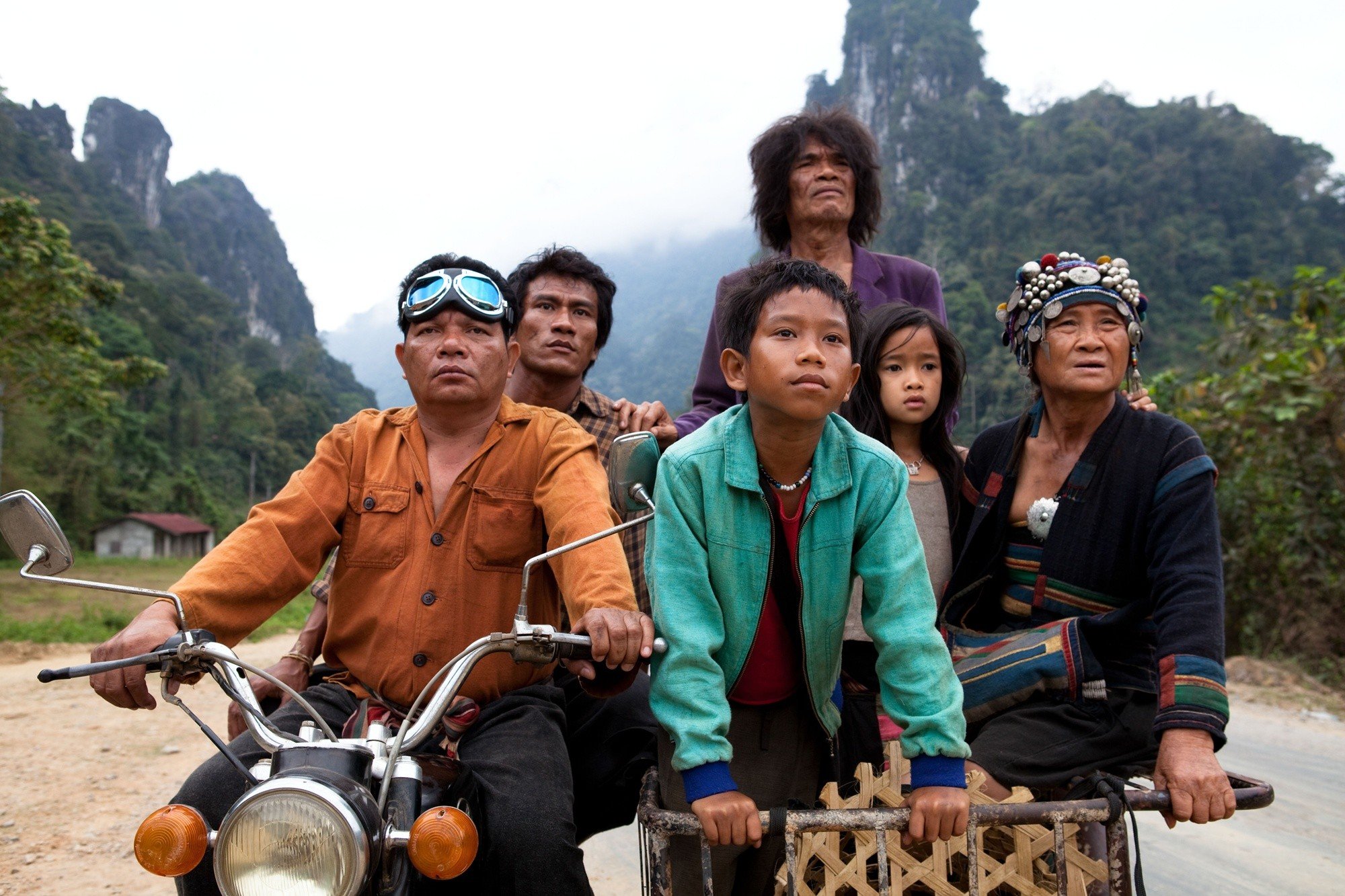 Sumrit Warin, Thep Phongam, Sitthiphon Disamoe, Loungnam Kaosainam and Bunsri Yindi in Kino Lorber's The Rocket (2014). Photo credit by Tom Greenwood.