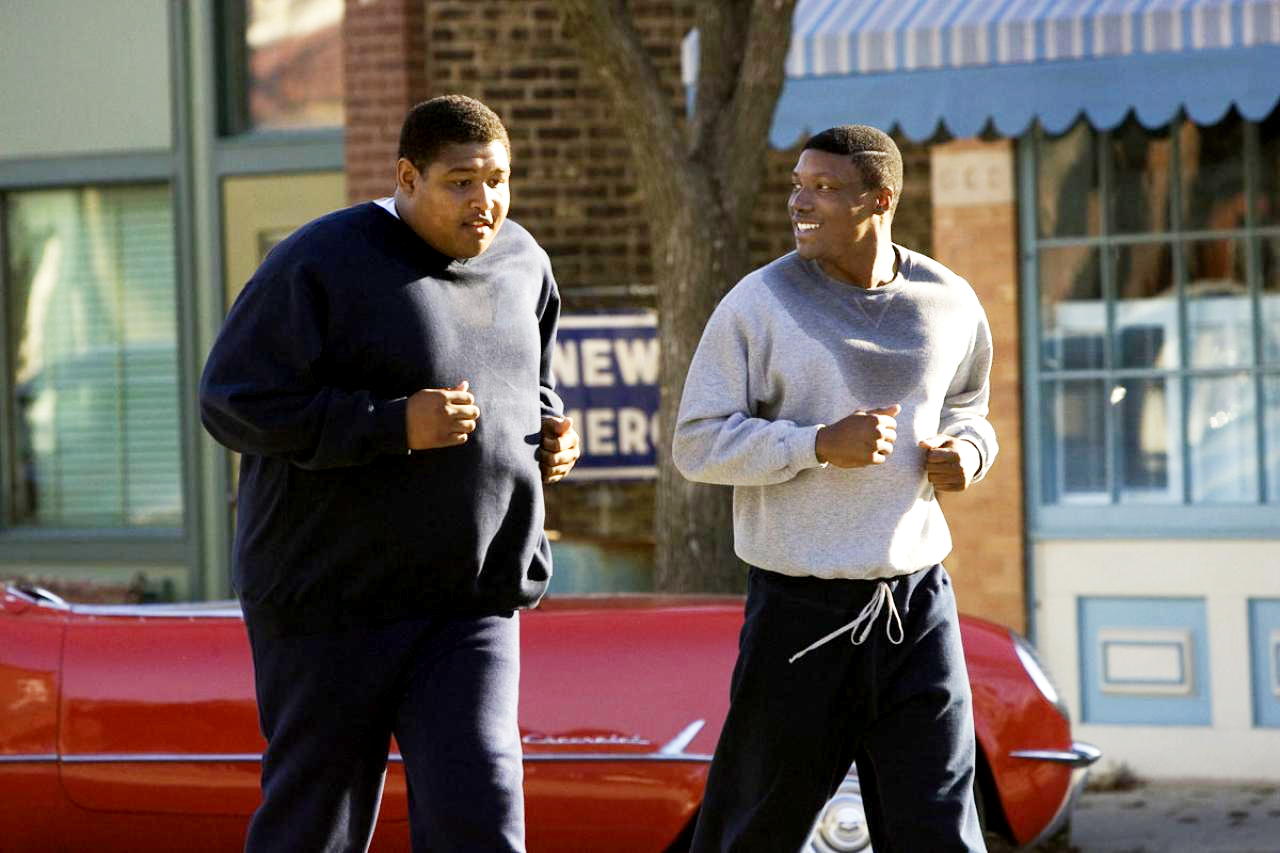 Omar Benson Miller stars as Jack Buckley and Rob Brown stars as Ernie Davis in Universal Pictures' The Express (2008)