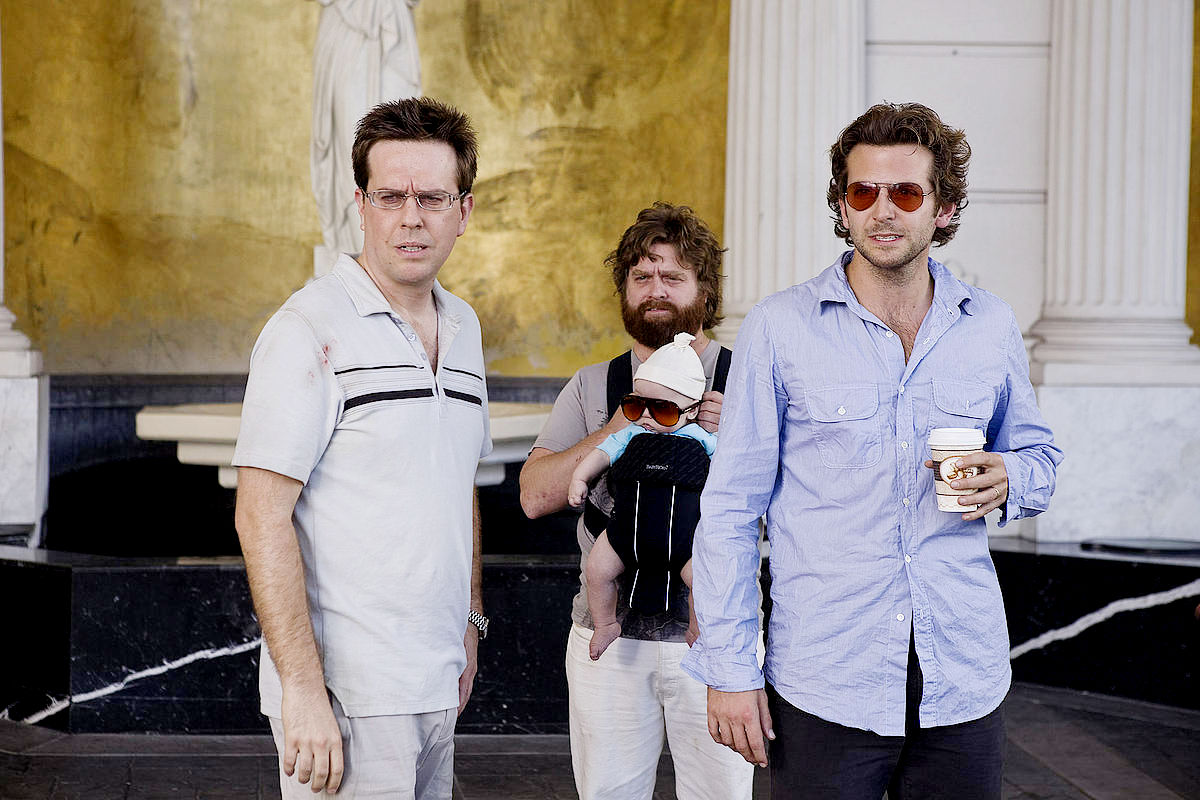 Ed Helms, Zach Galifianakis and Bradley Cooper in Warner Bros. Pictures' The Hangover (2009)