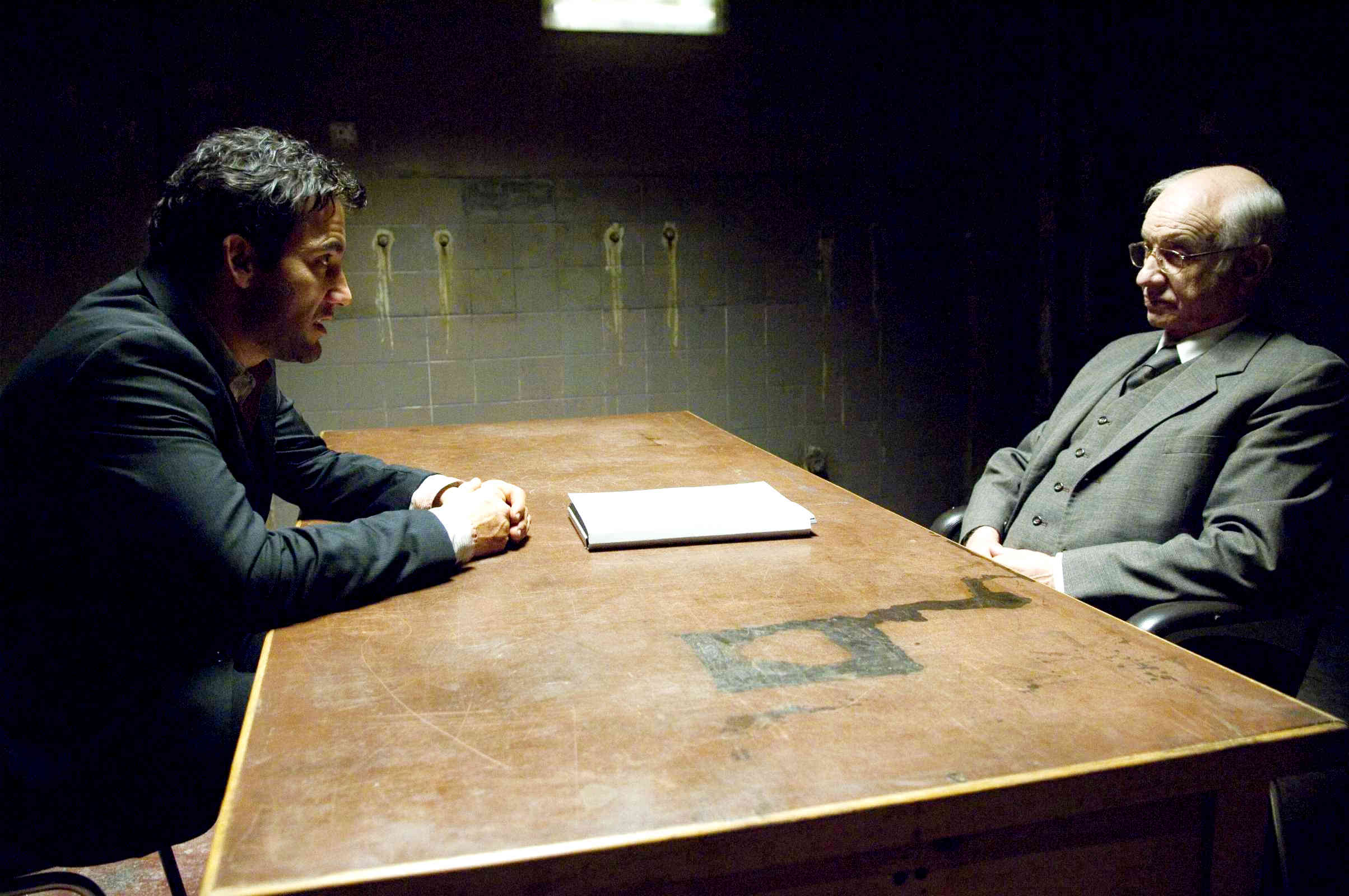 Clive Owen (Louis Salinger) and Armin Mueller-Stahl in Columbia Pictures' The International (2009). Photo credit by Jay Maidment.