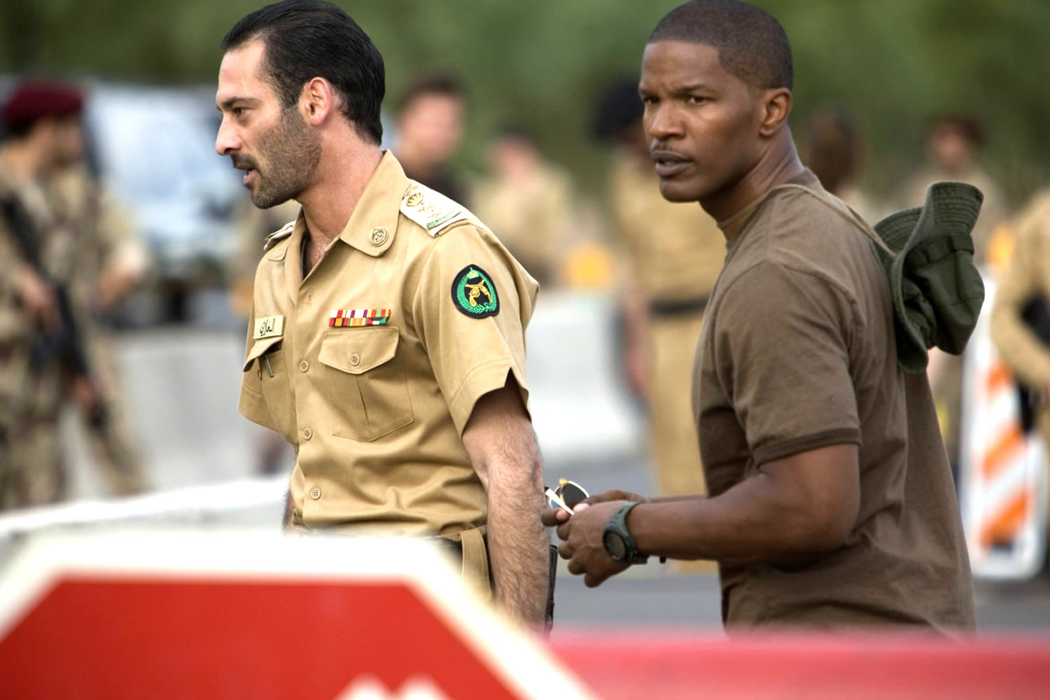 Ashraf Barhom as Col. Al-Ghazi and Jamie Foxx as Ronald Fluery in Universal Pictures' The Kingdom (2007)