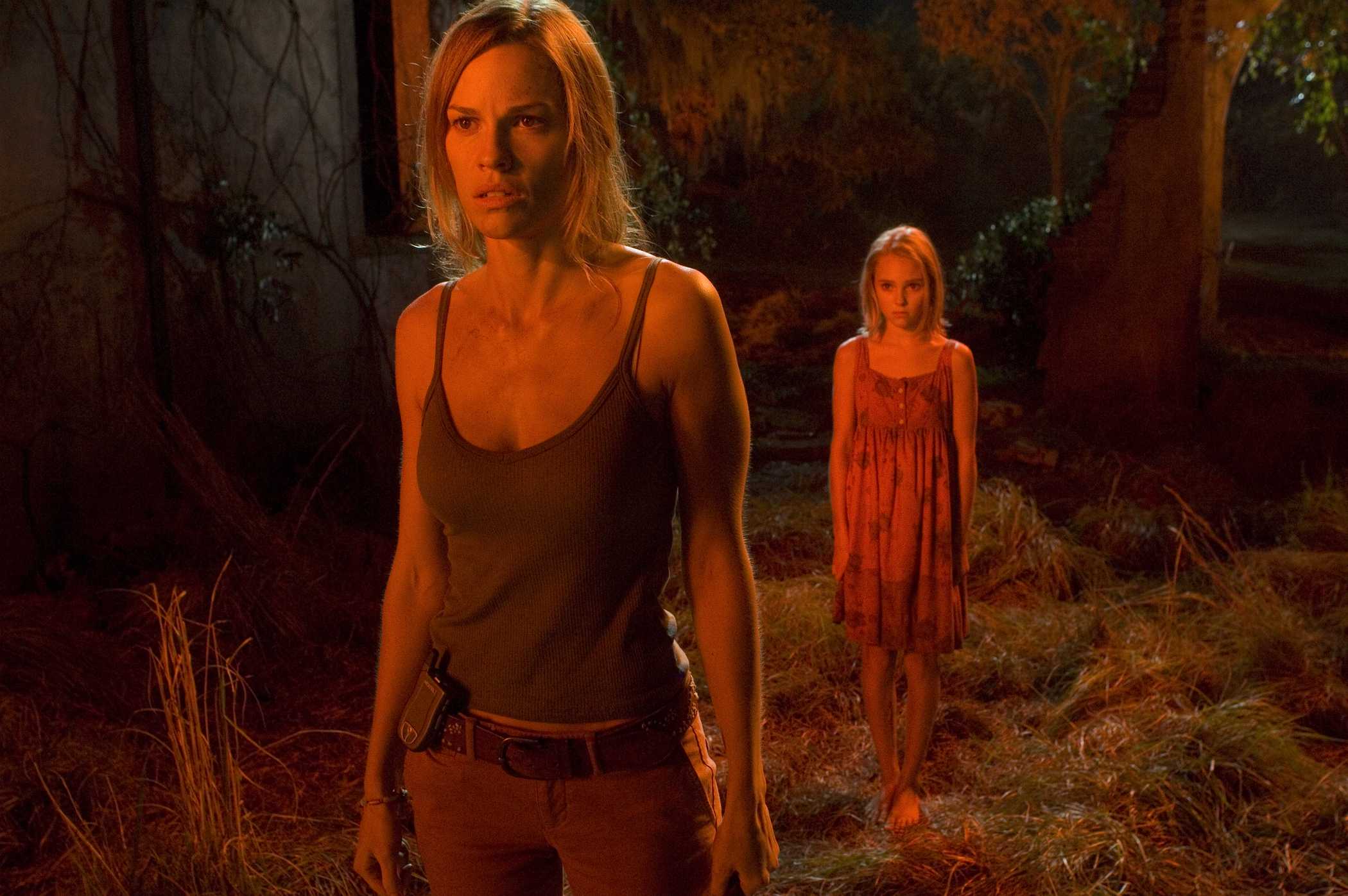 HILARY SWANK stars as Katherine and ANNASOPHIA ROBB as Loren in Warner Bros. Pictures' The Reaping (2006)