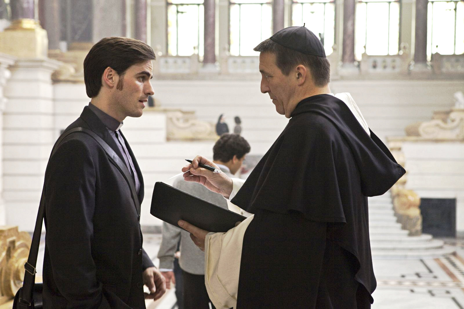 Colin O'Donoghue stars as Michael Kovak and Ciaran Hinds stars as Father Xavier in Warner Bros. Pictures' The Rite (2011). Photo credit by Egon Endrenyi.