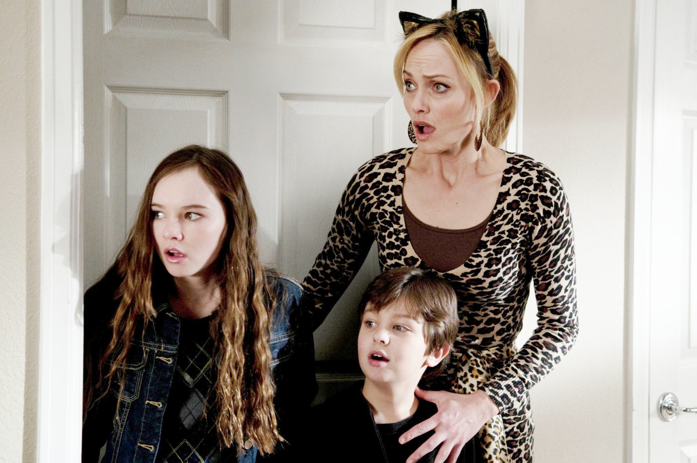 Madeline Carroll, Will Shadley and Amber Valletta in Lionsgate Films' The Spy Next Door (2010)