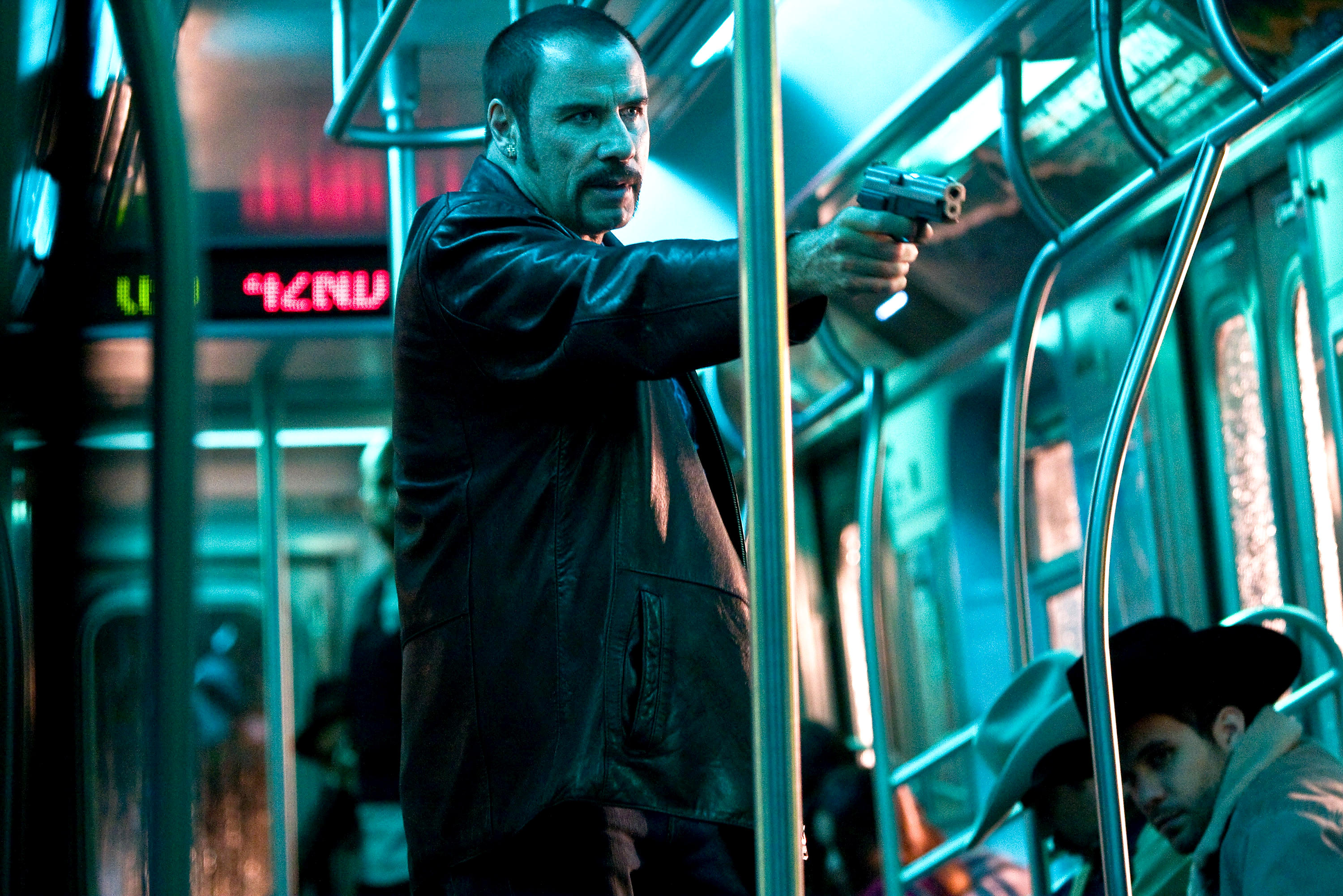 John Travolta stars as Ryder in Columbia Pictures' The Taking of Pelham 123 (2009). Photo credit by Stephen Vaughan.