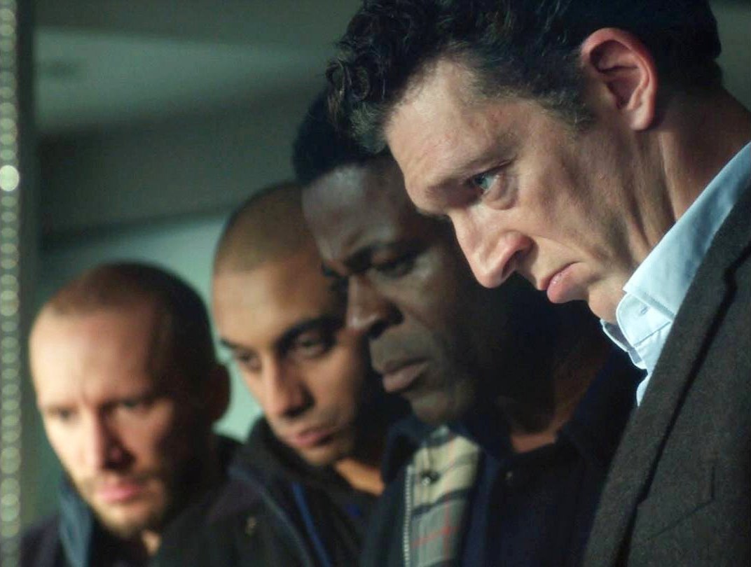 Danny Sapani stars as Nate and Vincent Cassel stars as Franck in Fox Searchlight Pictures' Trance (2013)