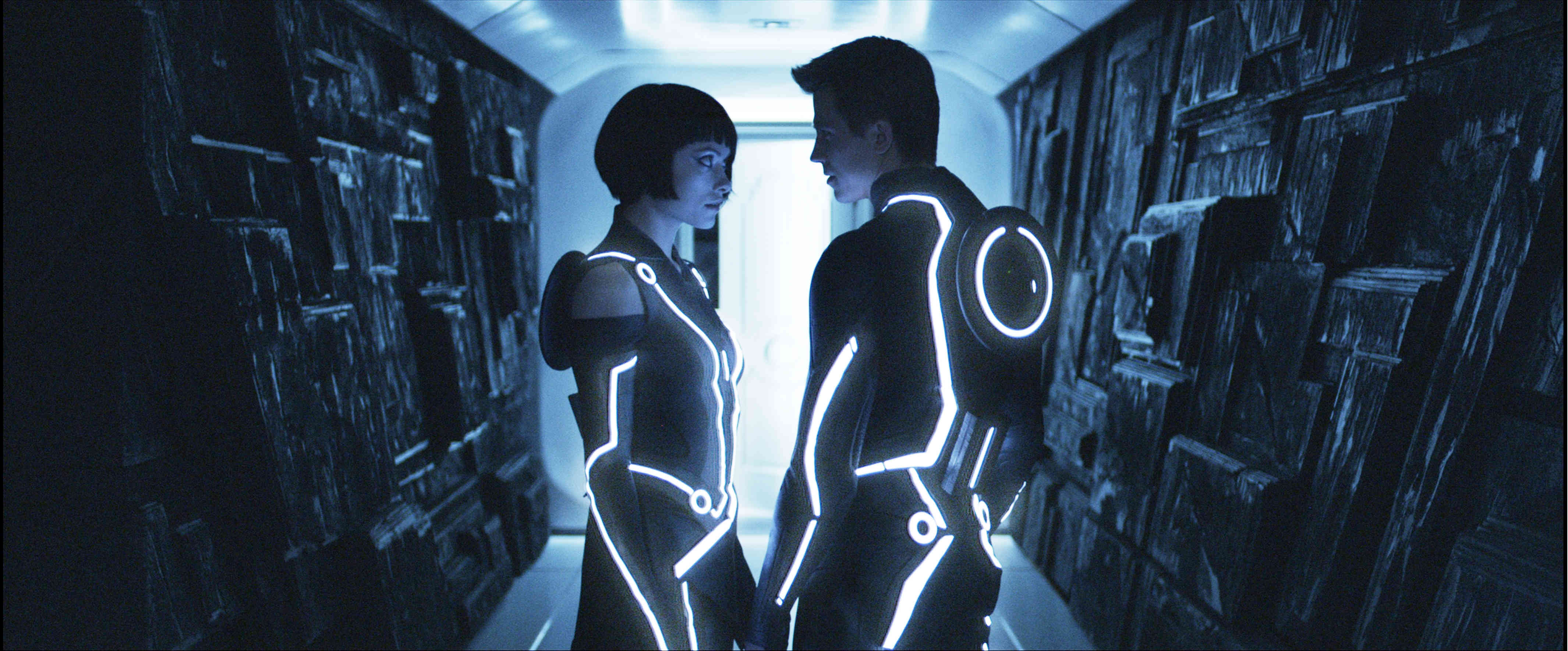 Olivia Wilde stars as Quorra and Garrett Hedlund stars as Sam Flynn in Walt Disney Pictures' Tron Legacy (2010)