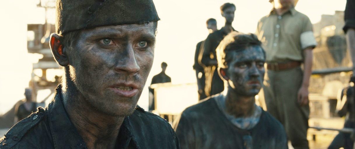 Garrett Hedlund stars as John Fitzgerald and Jack O'Connell stars as Louis Zamperini in Universal Pictures' Unbroken (2014)