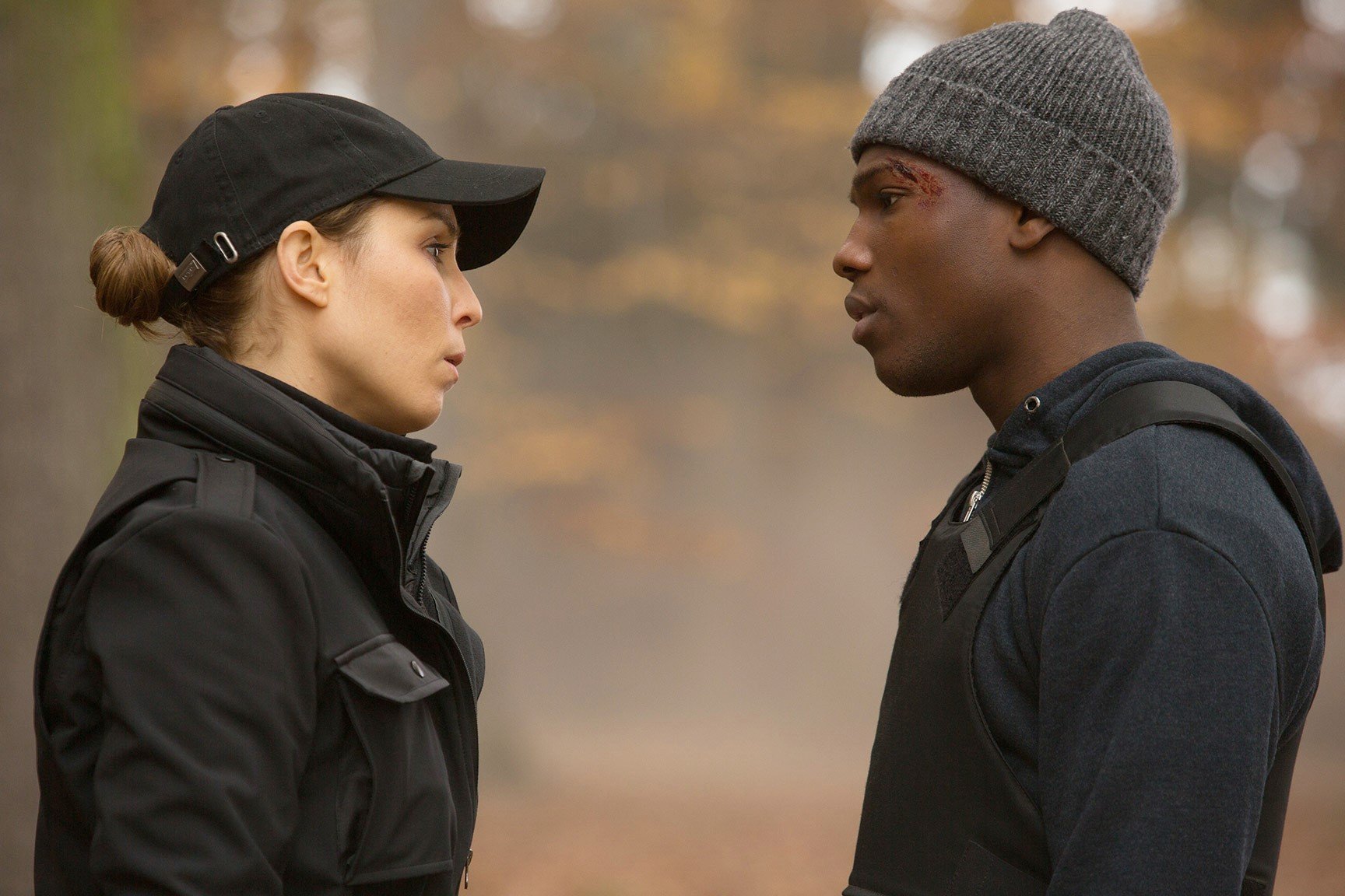 Noomi Rapace stars as Alice Racine and Tosin Cole stars as Amjad in Lionsgate Premiere's Unlocked (2017)