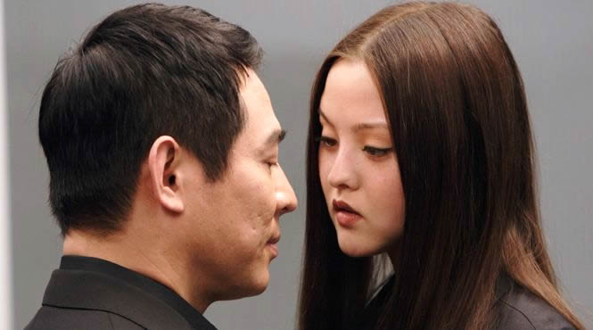 Jet Li as Rogue and Devon Aoki as Kira in Lions Gate Films' War (2007)