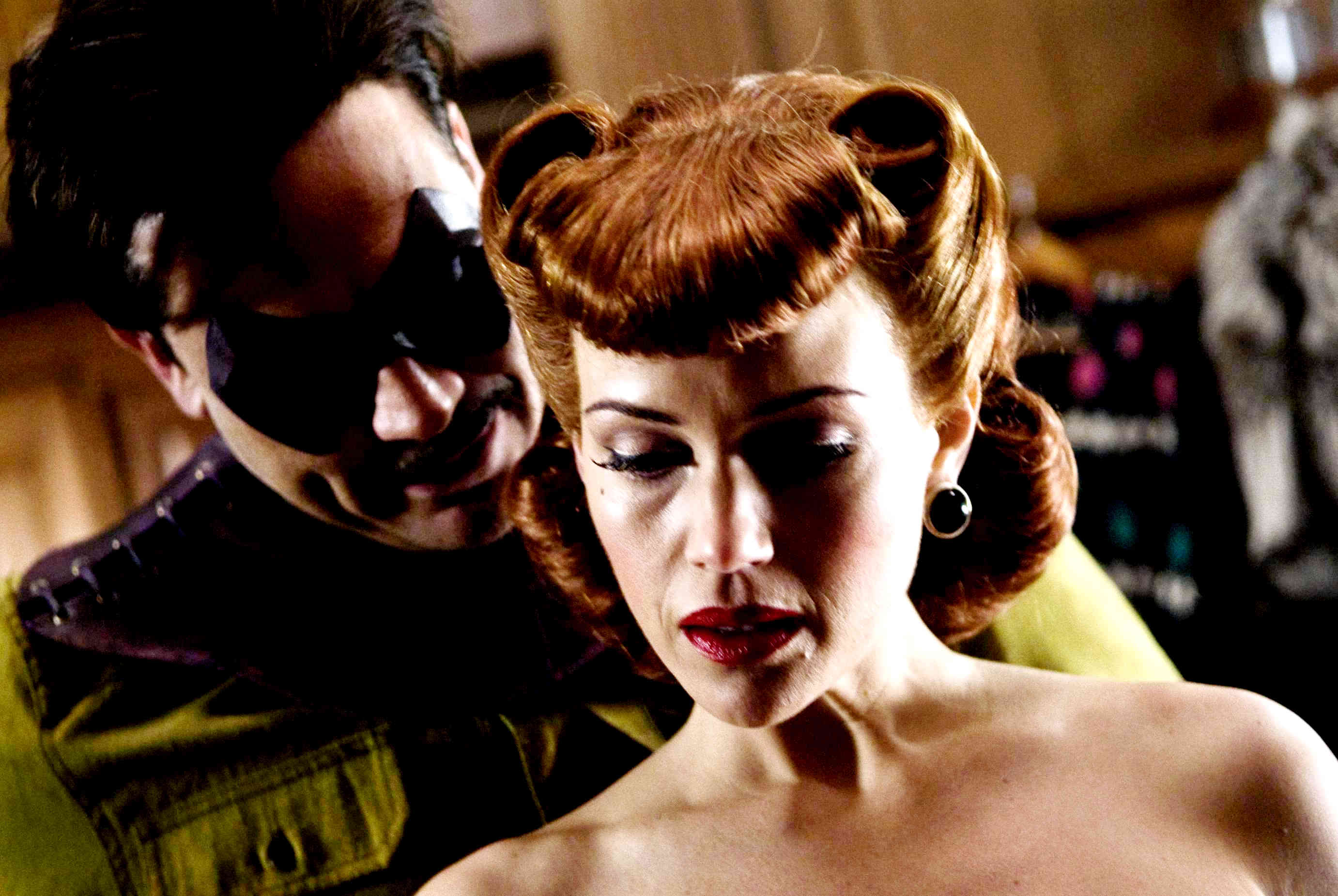 Jeffrey Dean Morgan as Edward Blake, aka the Comedian and Carla Gugino stars as Sally Jupiter, aka Silk Spectre in Warner Bros Films' Watchmen (2009)