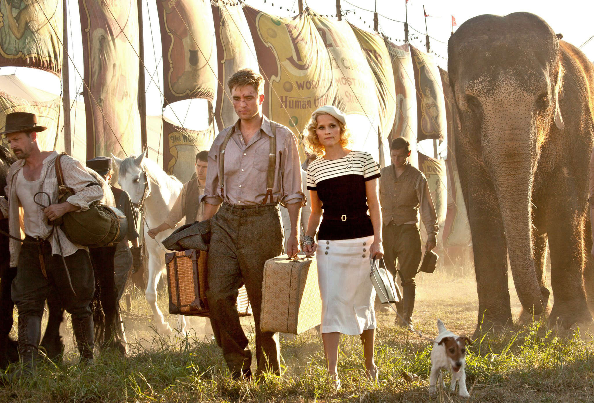 Robert Pattinson stars as Jacob Jankowski and Reese Witherspoon stars as Marlena Rosenbluth in 20th Century Fox's Water for Elephants (2011)