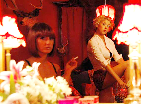 Emmanuelle Chriqui stars as Bambi and Adrianne Palicki stars as Holly Rocket in Screen Media Films' Women in Trouble (2009)