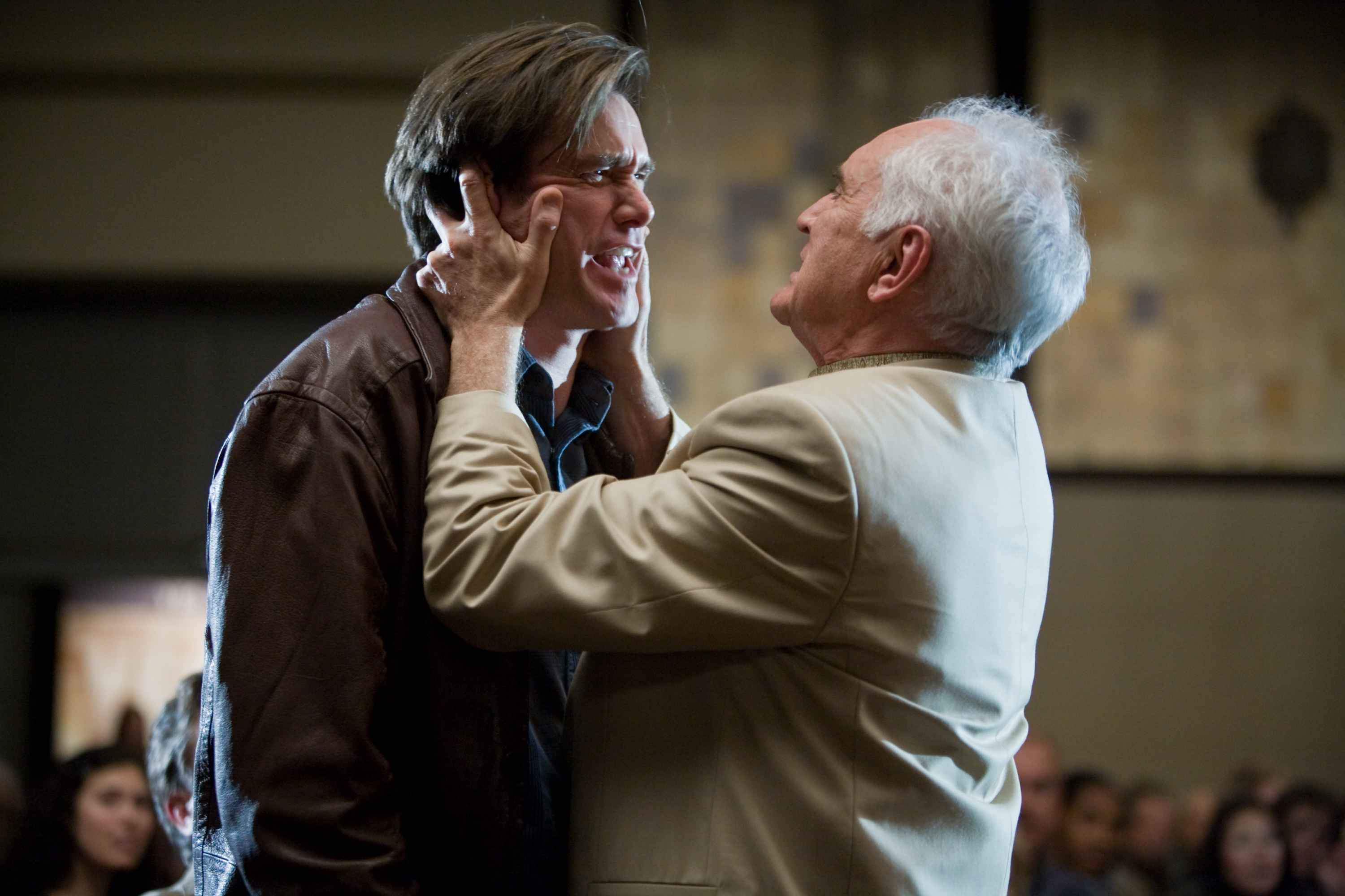 Jim Carrey stars as Carl Allen and Terence Stamp stars as Terrence Bundley in Warner Bros. Pictures' Yes Man (2008). Photo by Melissa Moseley.