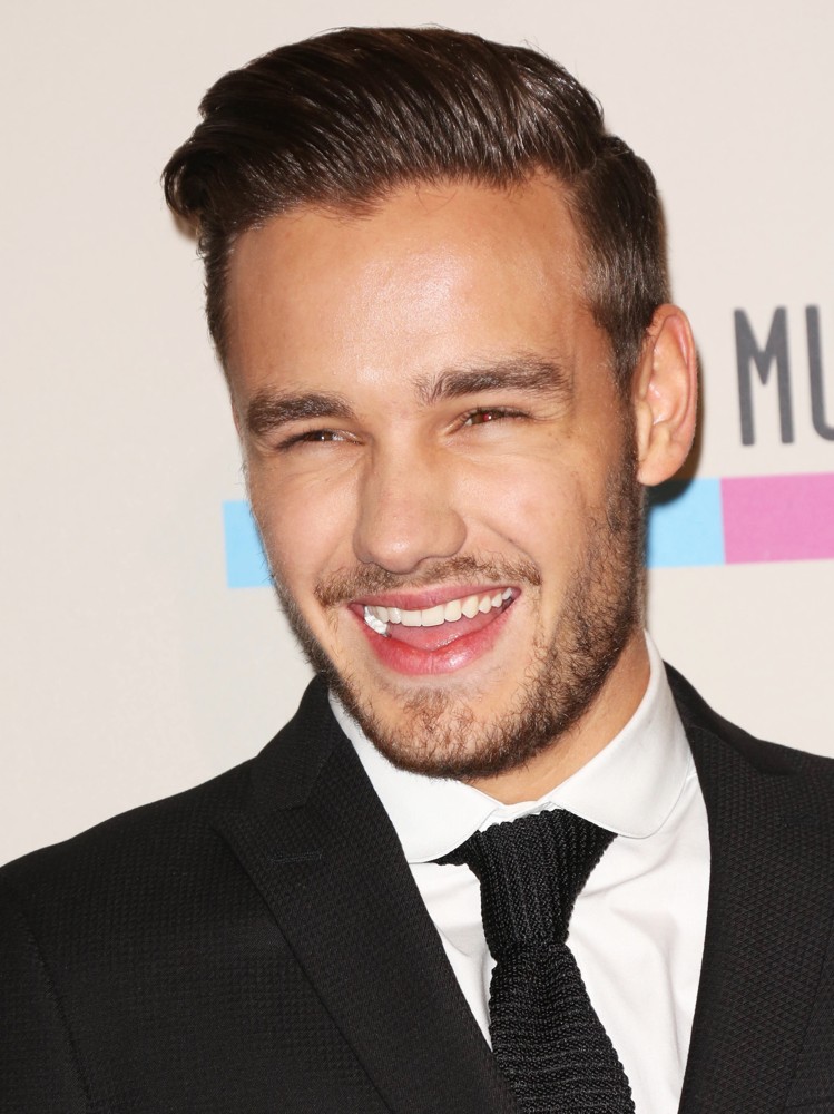 http://www.aceshowbiz.com/images/wennpic/liam-payne-2013-american-music-awards-press-room-03.jpg