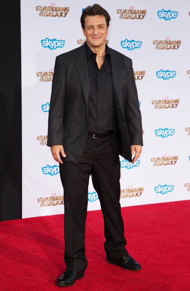http://www.aceshowbiz.com/images/wennpic/nathan-fillion-premiere-guardians-of-the-galaxy-03.jpg