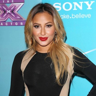 Adrienne Bailon in FOX's The X Factor Finalists Party - Arrivals
