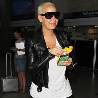 Amber Rose-Amber Rose Arrives at Los Angeles International Airport