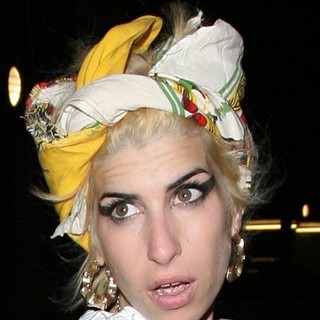 Amy Winehouse in Amy Winehouse Arrives Back Home After Visiting Her Friend Kelly Osbourne