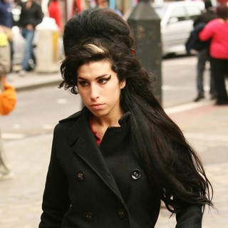 Amy Winehouse in Amy Winehouse Celebrated Her Album Back to Black's Expected Return to The Top