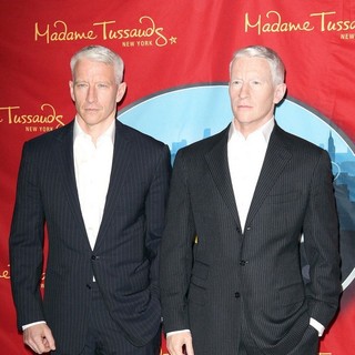 Anderson Cooper in Anderson Cooper AttendsThe Unveiling and Poses Next to His New Wax Figure