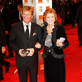 Nigel Lythgoe, Cilla Black in The Orange British Academy Film Awards (BAFTA Awards) - Arrivals
