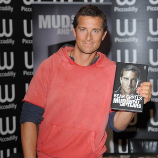 Bear Grylls in Bear Grylls Signs Copies of Recent Book Mud, Sweat and Tears