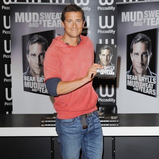 Bear Grylls in Bear Grylls Signs Copies of Recent Book Mud, Sweat and Tears