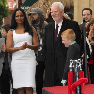 Garcelle Beauvais, Rob Zombie, Malcolm McDowell, Beckett Taylor McDowell in The Hollywood Walk of Fame Honors Malcolm McDowell