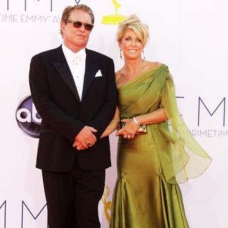 Tom Berenger, Patricia Alvaran in 64th Annual Primetime Emmy Awards - Arrivals