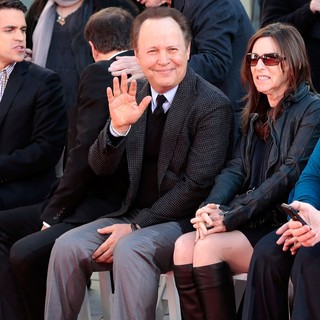 Billy Crystal in Robert De Niro Places His Hand and Foot Prints in Cement During The Footprint Ceremony
