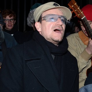 Bono Singing for Charity at The Entrance to St. Stephen's Park